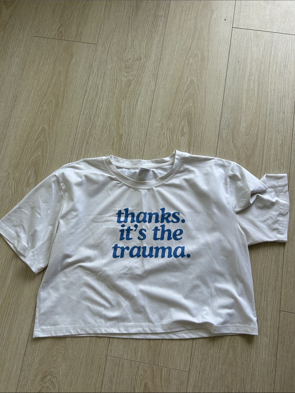 White Graphic Tee "thanks. it's the trauma." in Blue